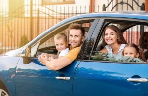 happy family driving safely