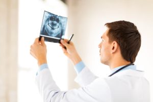 doctor examining a dental injury
