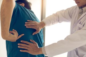 man with rib injury