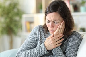 woman with dental injury